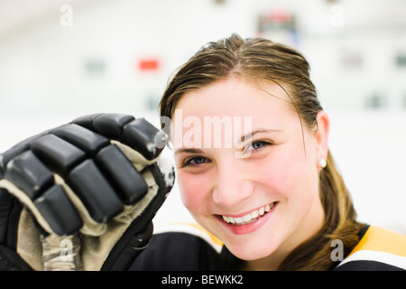 Portrait of an ice hockey player smiling Stock Photo