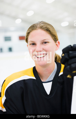 Portrait of an ice hockey player smiling Stock Photo