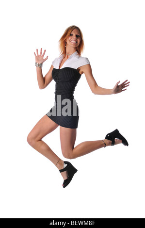 Young businesswoman jumping and wearing a short dress isolated on a white background Stock Photo