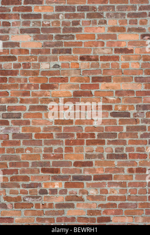 antique brick wall on a 19th century New England mill building Stock Photo
