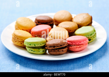 Fresh multicolored macaroon cookies served on a plate Stock Photo