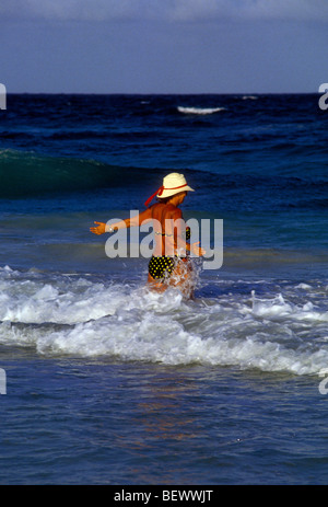 Mexican woman, Mexican, woman, bather, swimmer, swimming, public beach, Akumal, Quintana Roo State, Yucatan Peninsula, Mexico Stock Photo