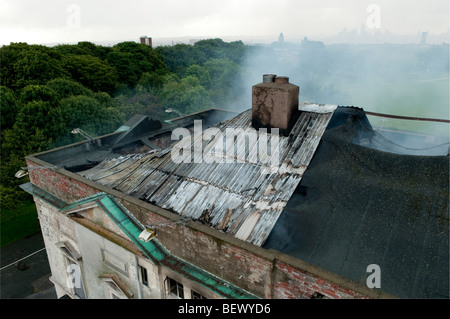 large derelict Georgian building on fire Stock Photo