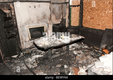 Severe house fire showing destroyed interior of house Stock Photo