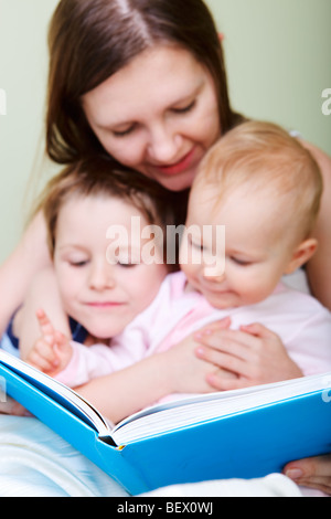 Family reading bedtime stories