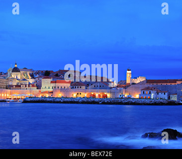 A panorama of an old city of Dubrovnik by night, Croatia Stock Photo