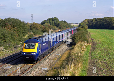 A FGW HST headed by power car 43033 powers though Shrivenham (Nr Swindon) on the GWML with a London - Swansea service on 13/10/0 Stock Photo