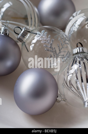 Glass and silver Christmas tree baubles Stock Photo