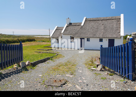 thatched cottage in Claddaghduff used as an holiday home, Connemara Ireland Stock Photo