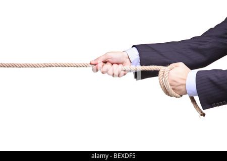 Businessman pulling a rope isolated on white background