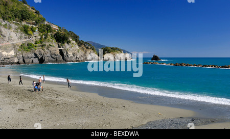 The beach and rough shoreline in the southern part of Monterosso al Mare, Cinque Terre, Liguria, Italy. Stock Photo