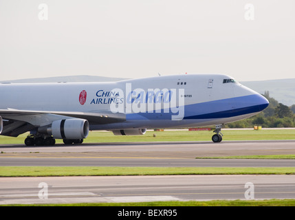 Cockpit and Front of China Airlines Cargo Boeing 747-409F Freighter Airliner B-18725 Taxiing at Manchester Airport England Stock Photo