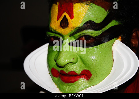 Kathakali ,Malayalam,is a highly stylised classical Indian dance-drama noted for its attractive,greenish face,painted face, Stock Photo