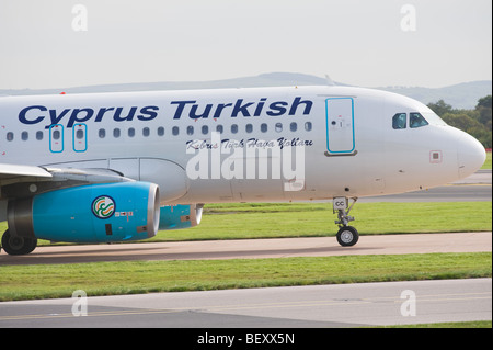 Cockpit and Main Cabin of Cyprus Turkish Airlines Airbus A320-232 Airliner TC-TCC at Manchester International Airport England UK Stock Photo