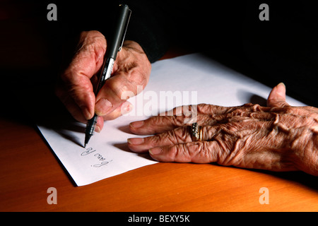 elderly woman write a letter Stock Photo