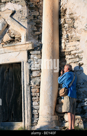 greece cyclades sikinos tourist using a digital compact camera Stock Photo