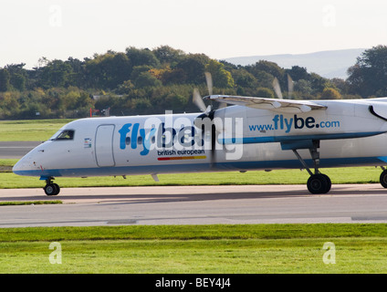 Flybe Bombardier DHC-8-402 Q400 Dash 8 Airliner G-JECI Taxiing at Manchester Ringway Airport England United Kingdom Stock Photo