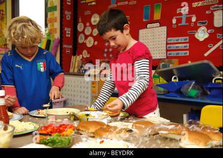 Young pupils dressed in Italian national costumes for International Day at Ysgol Gymraeg Aberystwyth welsh medium primary school Stock Photo