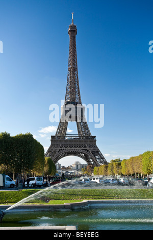 The Eiffel Tower 320m 1050ft high viewed from Parc du Champ de Mars Paris France Stock Photo