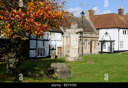 Properties situated in the churchyard of the Parish Church of St John the Baptist in Devizes Wiltshire England UK Stock Photo