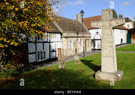 Properties situated in the churchyard of the Parish Church of St John the Baptist in Devizes Wiltshire England UK Stock Photo