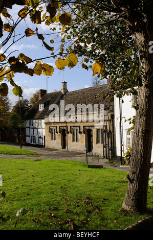 Properties situated in the churchyard of the Parish Church of St John the Baptist in Devizes Wiltshire England UK Stock Photo