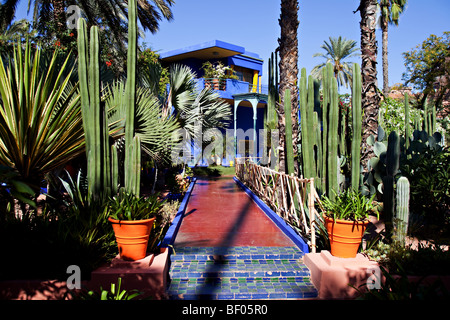 Tourists visiting Majorelle Garden owned by Yves Saint Laurent in Marrakesh, Morocco Stock Photo