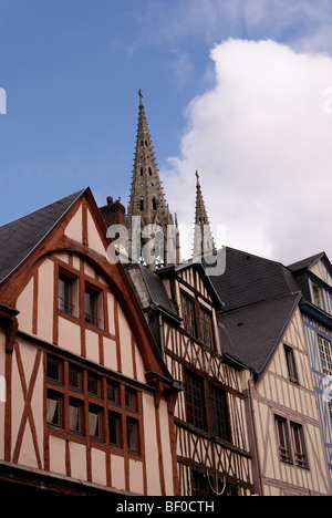 France, street of Rouen in Normandy with the Abbey church of Saint-Ouen towers in  the ground Stock Photo