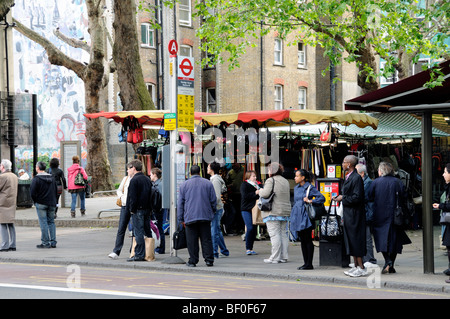 People at Bus stop Tottenham Court Road, London England UK Stock Photo