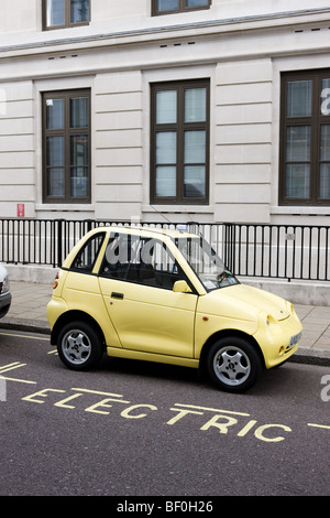 An Electric Car charges up at one of Westminster's 'Juice Point'  parking bays Stock Photo
