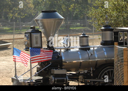 Railroad at Irvine Park in Orange, CA, USA gives rides to families. Stock Photo