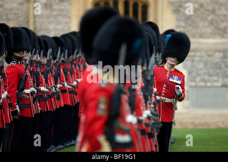 Soldiers from the Irish Guards prepare for a parade at Windsor Castle in England Stock Photo