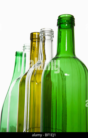 A row of recyclable glass bottles Stock Photo