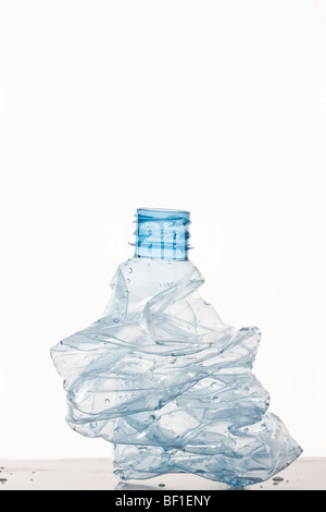 A crumpled plastic water bottle Stock Photo