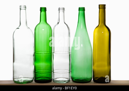 A row of recyclable glass bottles Stock Photo