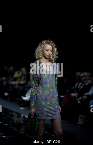 A model displays a creation by Russian fashion designer Lena Karin during Moscow Fashion week on October 25, 2009 Stock Photo
