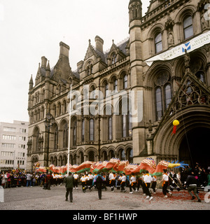 UK, England, Manchester, Albert Square, Chinese New Year dragon procession outside Manchester Town Hall Stock Photo