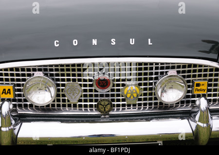 Car Badges on the Grill of a Ford Consul Car Stock Photo