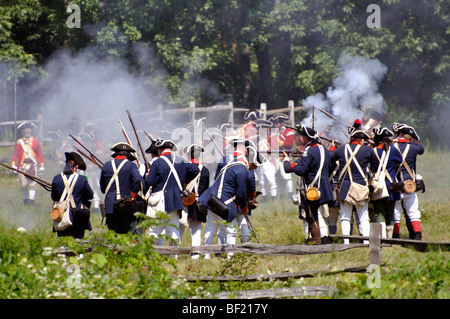 American Patriots in battle - costumed American Revolutionary War (1770's) era re-enactment Stock Photo