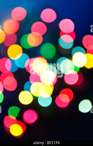 Out of focus multicolored Christmas light background Stock Photo