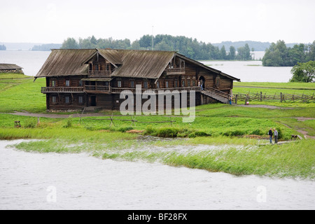 Wooden house on Kizhi island on lake Onega, the second biggest lake in Europe, Karelia, Russia Stock Photo