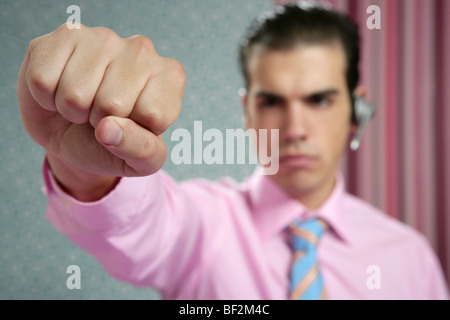angry aggresive businessman with fist closeup to camera Stock Photo