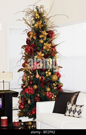 Christmas tree in a living room Stock Photo