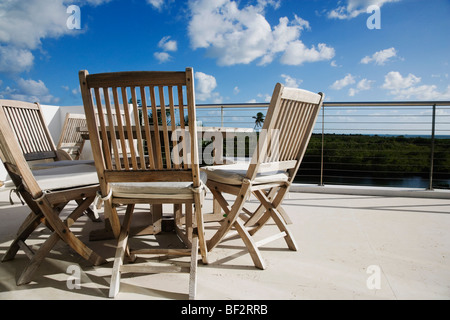 Chairs with a table in a balcony Stock Photo