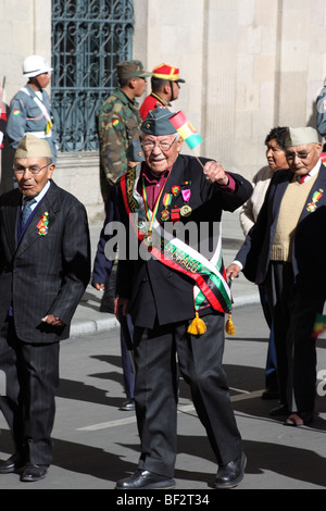 Chaco War veterans pass the presidential palace during Independence Day (6 August) parades , Plaza Murillo, La Paz , Bolivia . Stock Photo