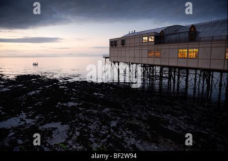 Dusk over the Royal Pier pavilion on Cardigan Bay Aberystwyth Wales UK Stock Photo