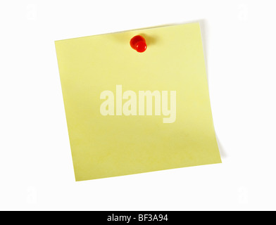yellow note with red pin over white background Stock Photo
