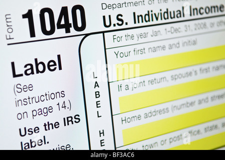 Individual income tax forms from the United States on computer monitor Stock Photo