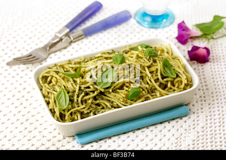 Spaghetti with pesto sauce. Recipe available. Stock Photo