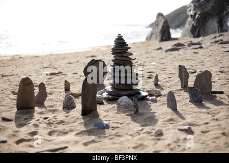 A ring of stones on Porthbeor beach in Cornwall Stock Photo